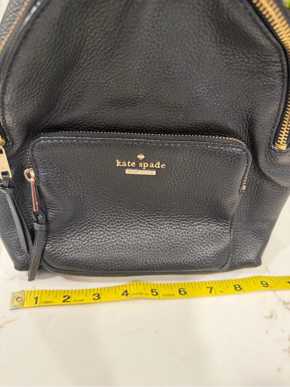 Kate Spade Black Pebbled Leather Backpack with Gold Hardware Striped Interior - Picture 8 of 9